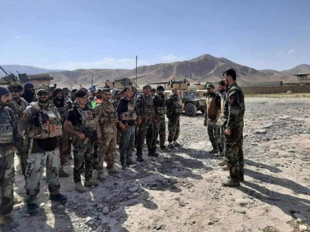 Tajikistan president orders 20,000 military reservists to bolster border as Afghan troops seek refuge