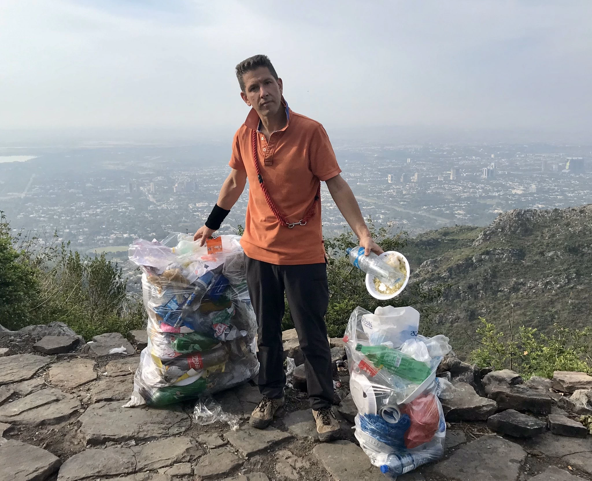 British envoy collects garbage from Margalla Hills on hiking