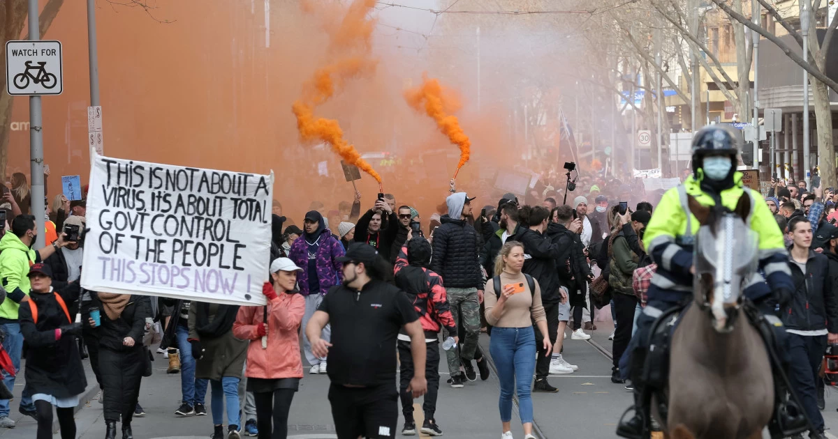 Thousands in Australia take to streets to protest lockdown, police detain several