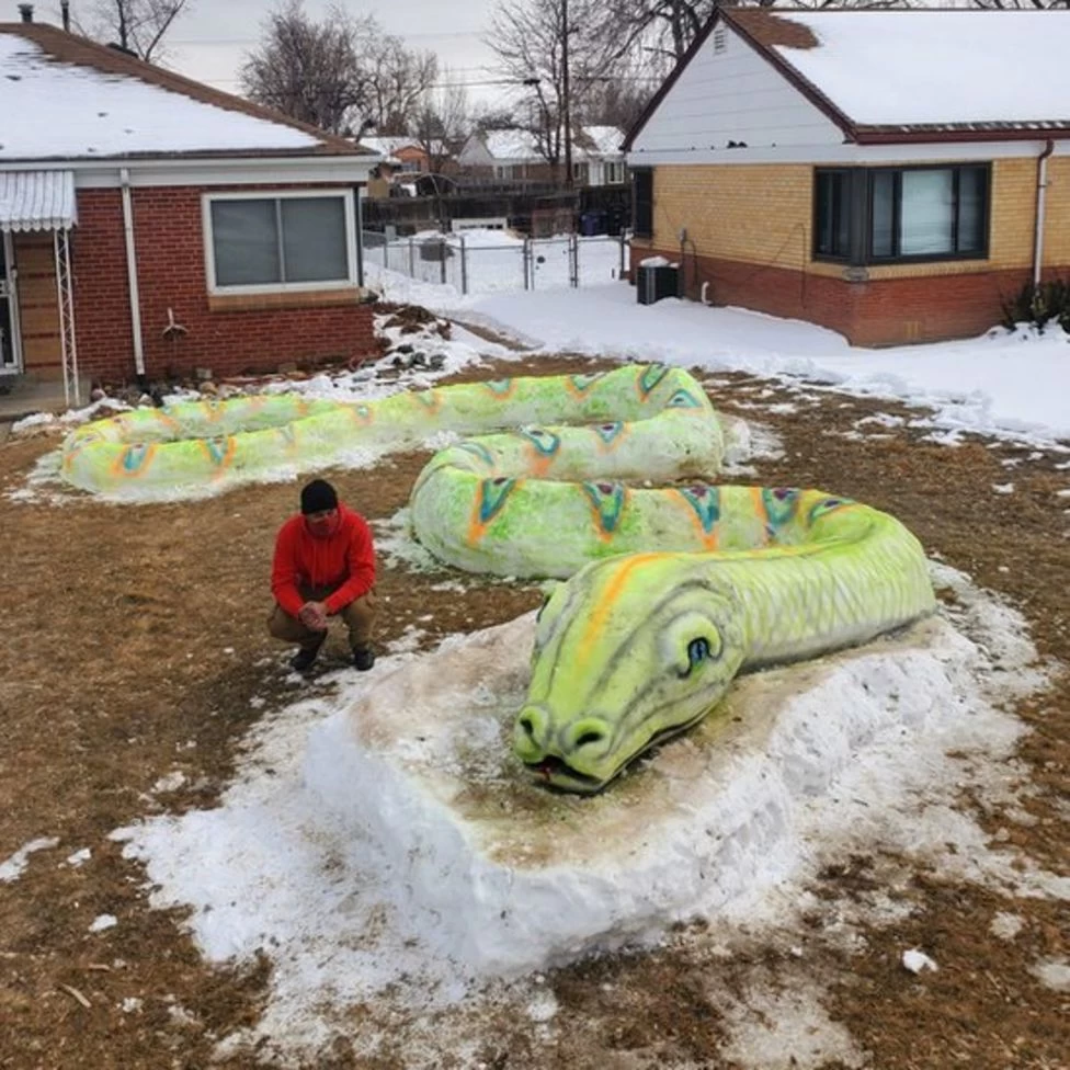 Family in Colorado stuns everyone with amazing snake snow sculpture