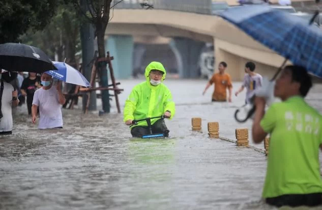 12 killed, thousands evacuated as floods ravage China