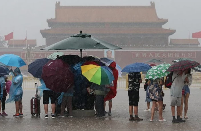 Nearly 700 flights cancelled, schools closed as Beijing hit by storm