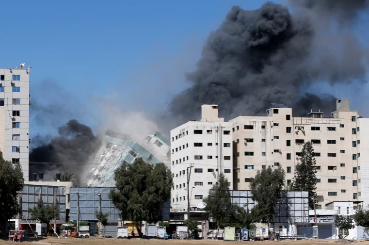 Israel razes building that houses Al-Jazeera, AFP, AP