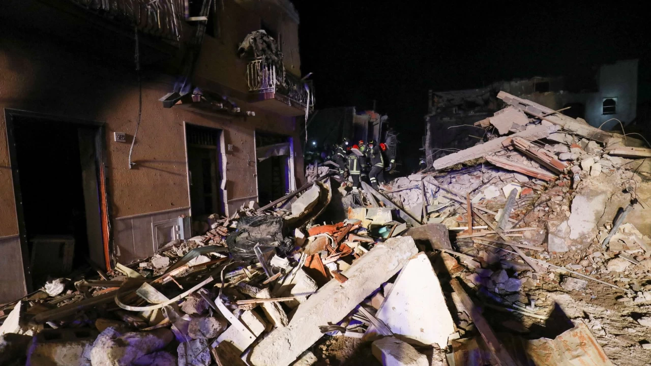 One dead, several missing after building collapses in Italy   