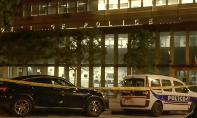 Two Paris officers injured after man shoots them inside police station