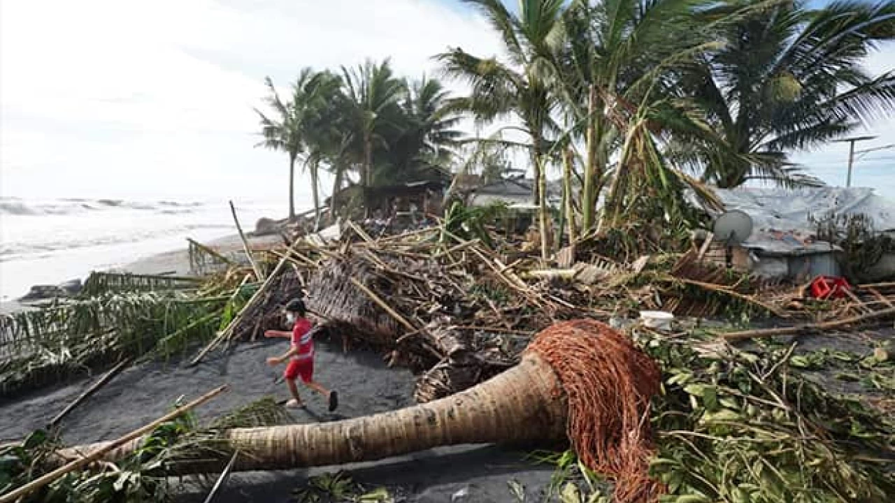 At least 12 dead as Philippines typhoon floods villages, uproots trees