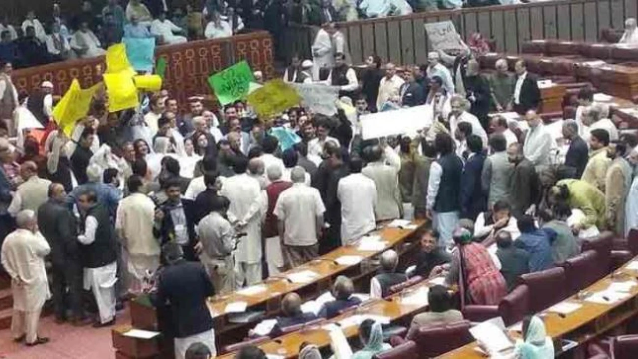 Opposition stage strong protest, tear budget copies