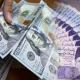 Rupee shed three paise against dollar