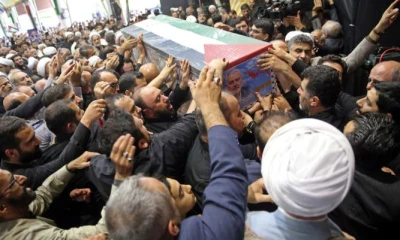 Slain Hamas leader Haniyeh buried in Qatar amid vows of revenge against Israel