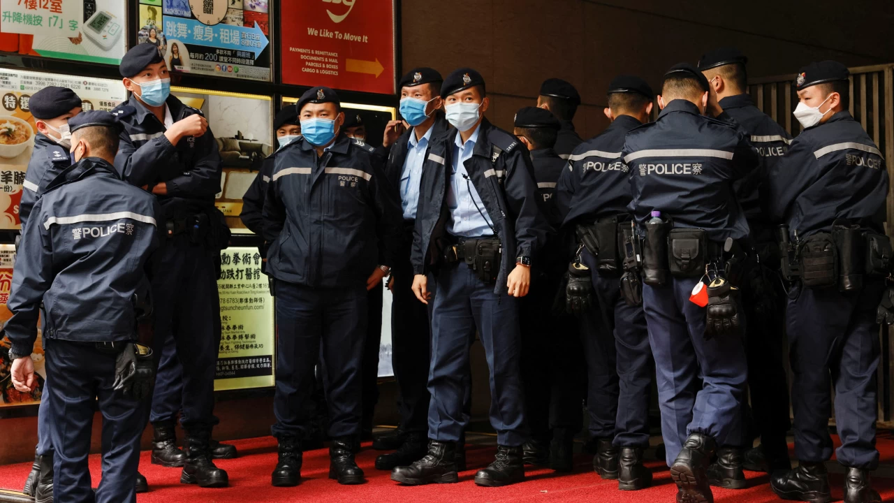 Hong Kong police raid pro-democracy news outlet, arrest six