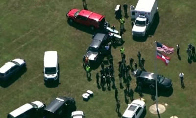 Shooting in Georgia high school leaves 4 dead, one person in custody, authorities say