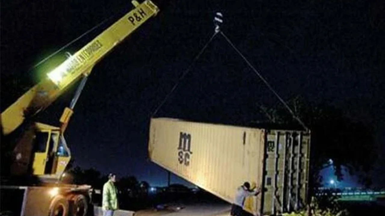 PTI’s Lahore rally: Heavy machinery at Peshawar Motorway to remove containers