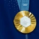 Olympian offers to will stolen gold medal to thief