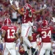 Bama blows 28-0 lead, escapes UGA on late TD