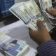 Rupee depreciates marginally against US dollar in interbank