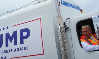 Donald Trump boards a garbage truck to draw attention to Biden remark