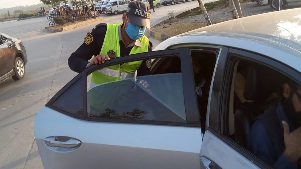 Crackdown against false number plates, tinted car windows in Karachi