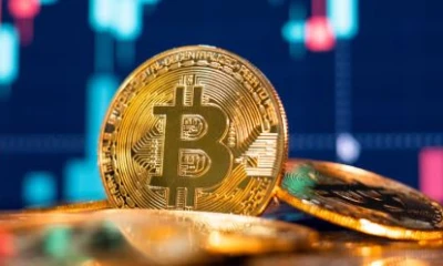 Crpto giant Bitcoin touches record high of $100,000