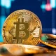 Crpto giant Bitcoin touches record high of $100,000