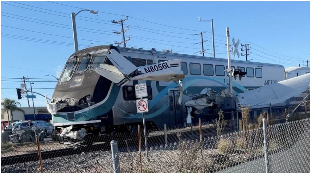 Video: Train hits crashed plane seconds after pilot rescued 