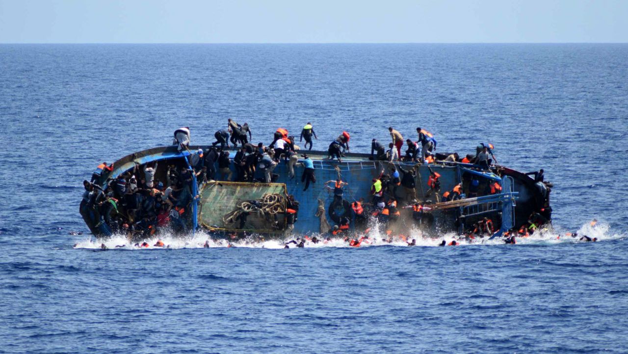 At least 50 killed after refugee boat catches fire off Libyan coast