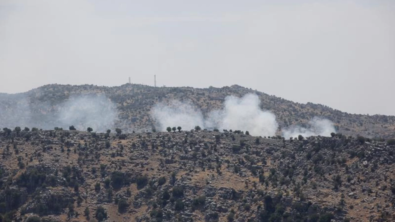 Hezbollah fires barrage of rockets after Israeli airstrikes