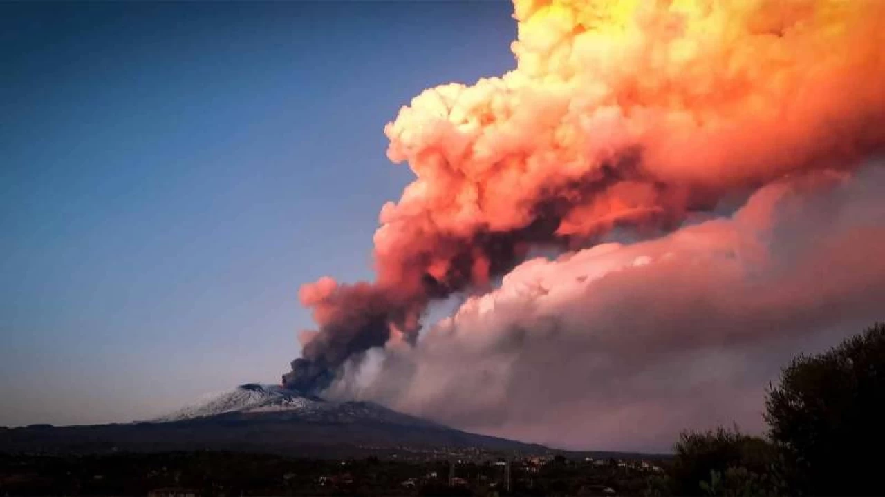 Italy's Etna spews smoke and ashes, closing airport