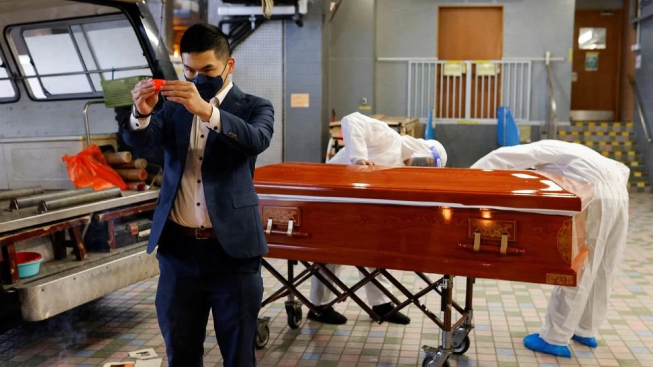 'So many bodies piled up': Hong Kong funeral services overwhelmed by COVID