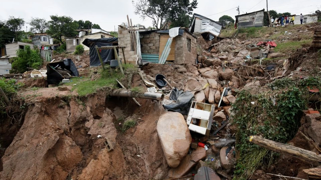 South African flood victims search for bodies of lost loved ones