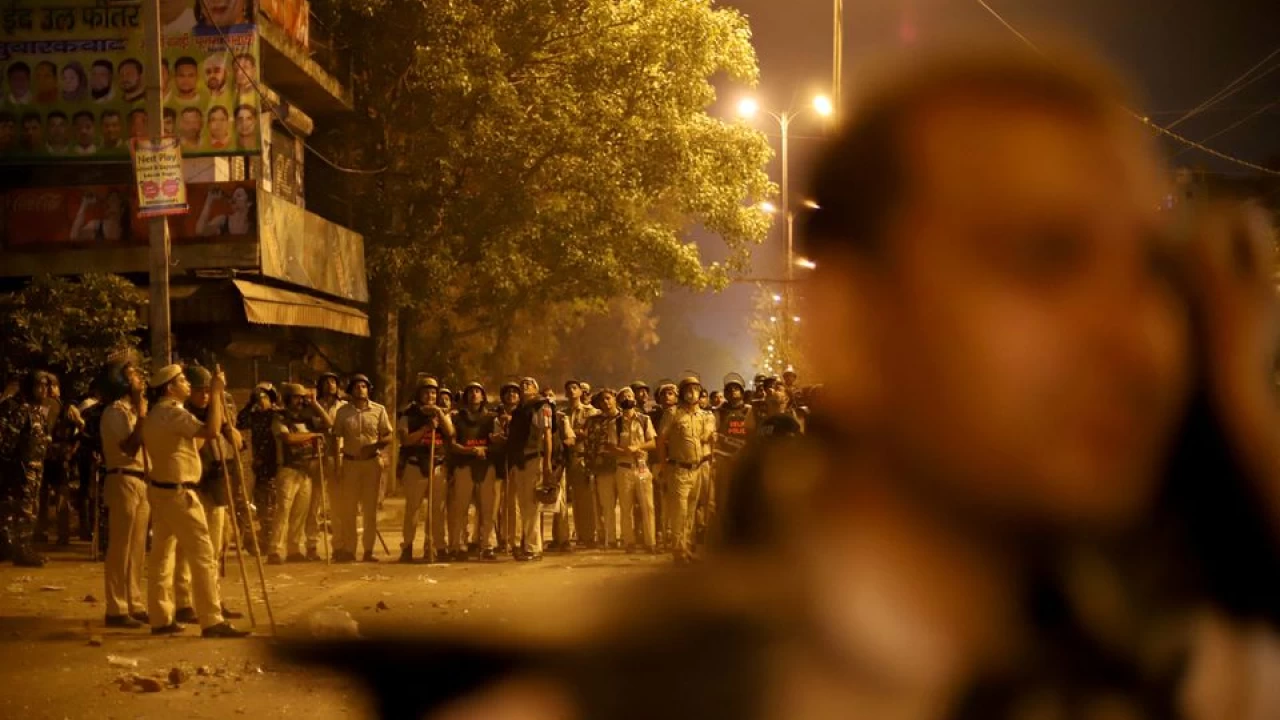 Indian police arrest 14 after communal clashes in New Delhi