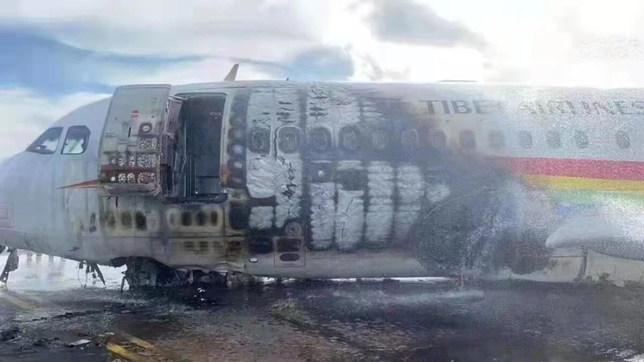 Plane carrying 122 skids off runway, catches fire 