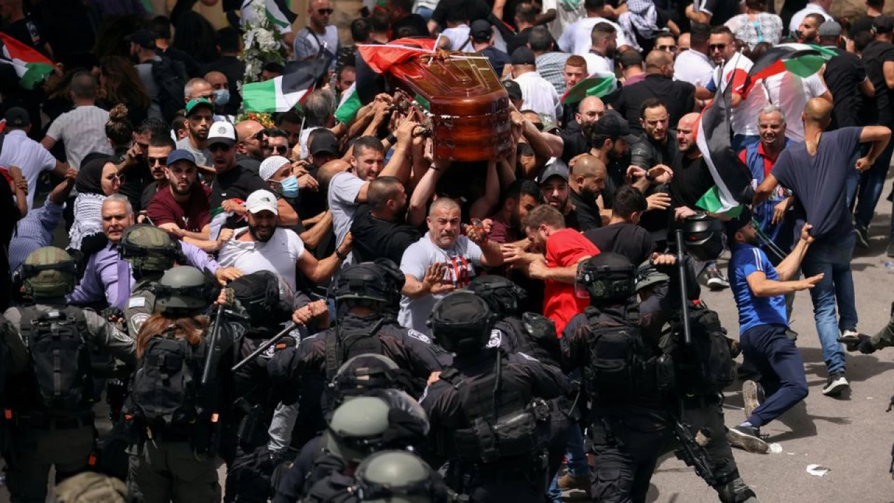Israeli police beat pallbearers at Al Jazeera journalist’s funeral