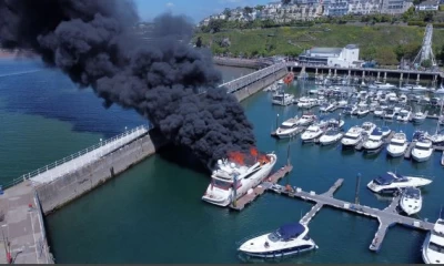 Superyacht catches fire in British marina