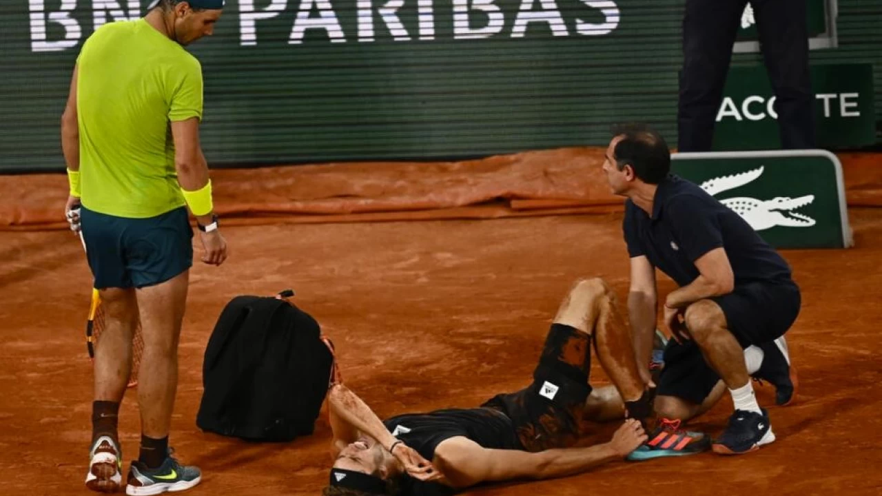 Nadal reaches 14th French Open final as Zverev quits with horror injury