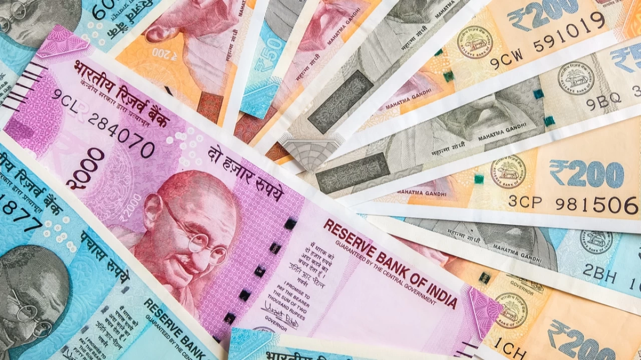 Indian rupee drops record low against US dollar amid expected Fed rate hike