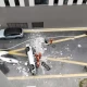 Chinese electric car falls from third-floor parking lot; kills two