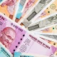Indian rupee hits record low against US dollar as inflation  sustains