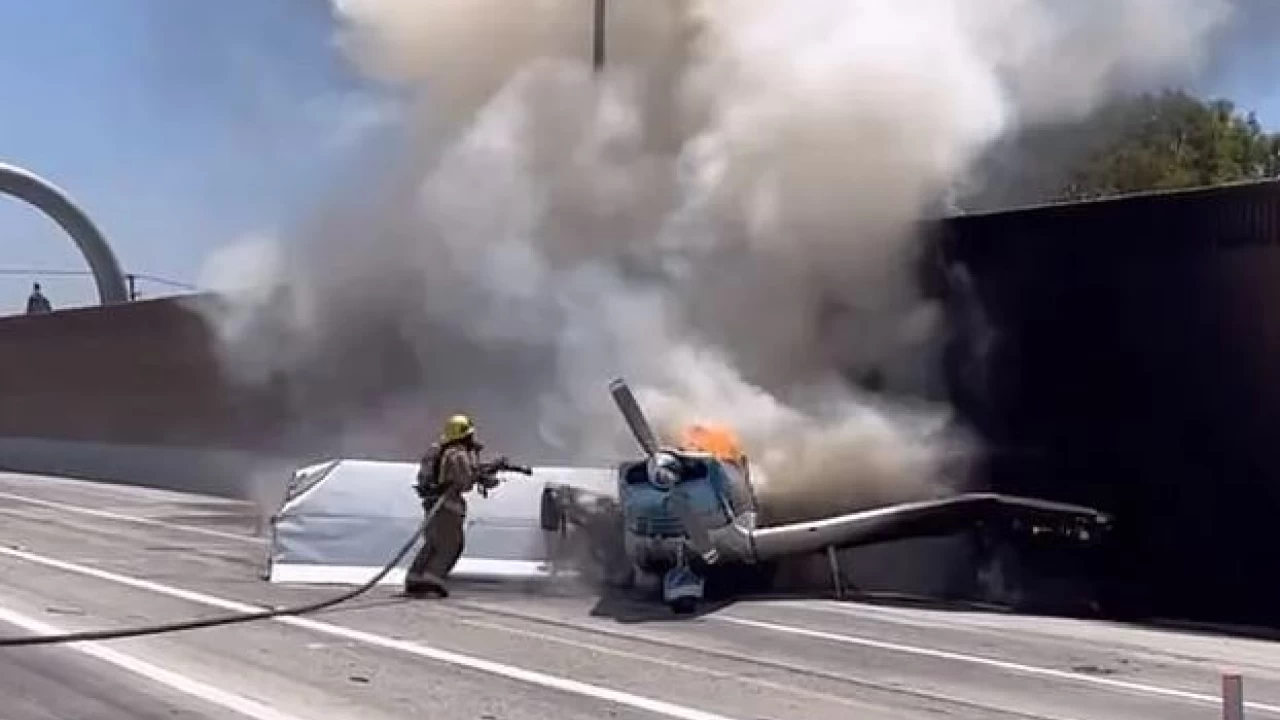 Plane crash-lands on US highway; bursts into flames  