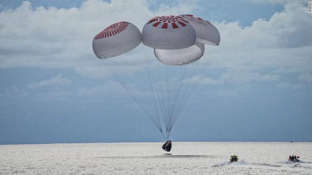 SpaceX capsule returns four civilians from orbit