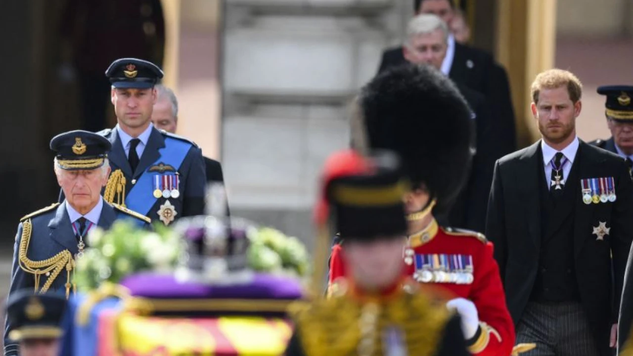King Charles, sons follow coffin for queen's last journey from palace
