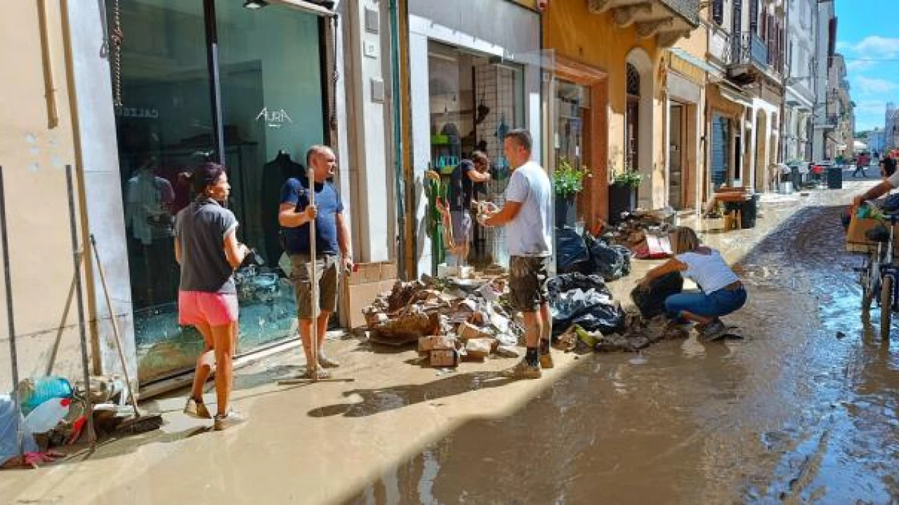 Floods in Italy kill 10; Survivors plucked from roofs, trees