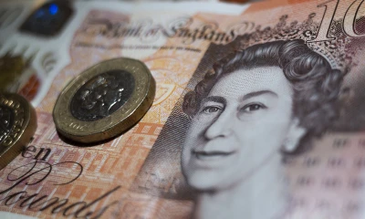 British pound drops, bonds sink after govt announces tax cuts