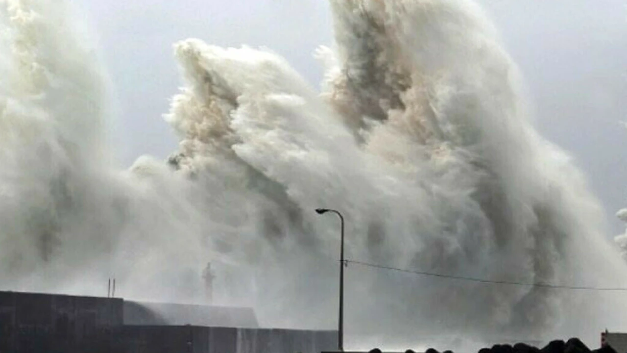 Typhoon lashes central Japan killing two