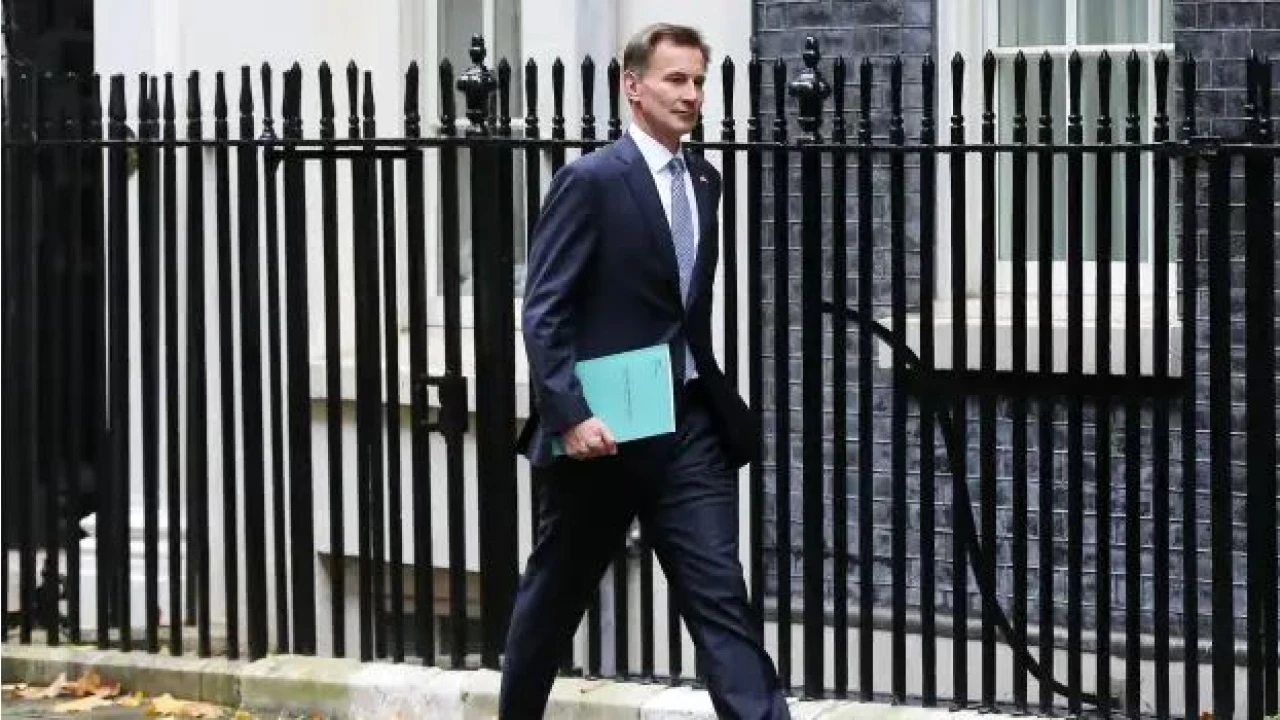 Britain FM announces tax hikes, spending cuts