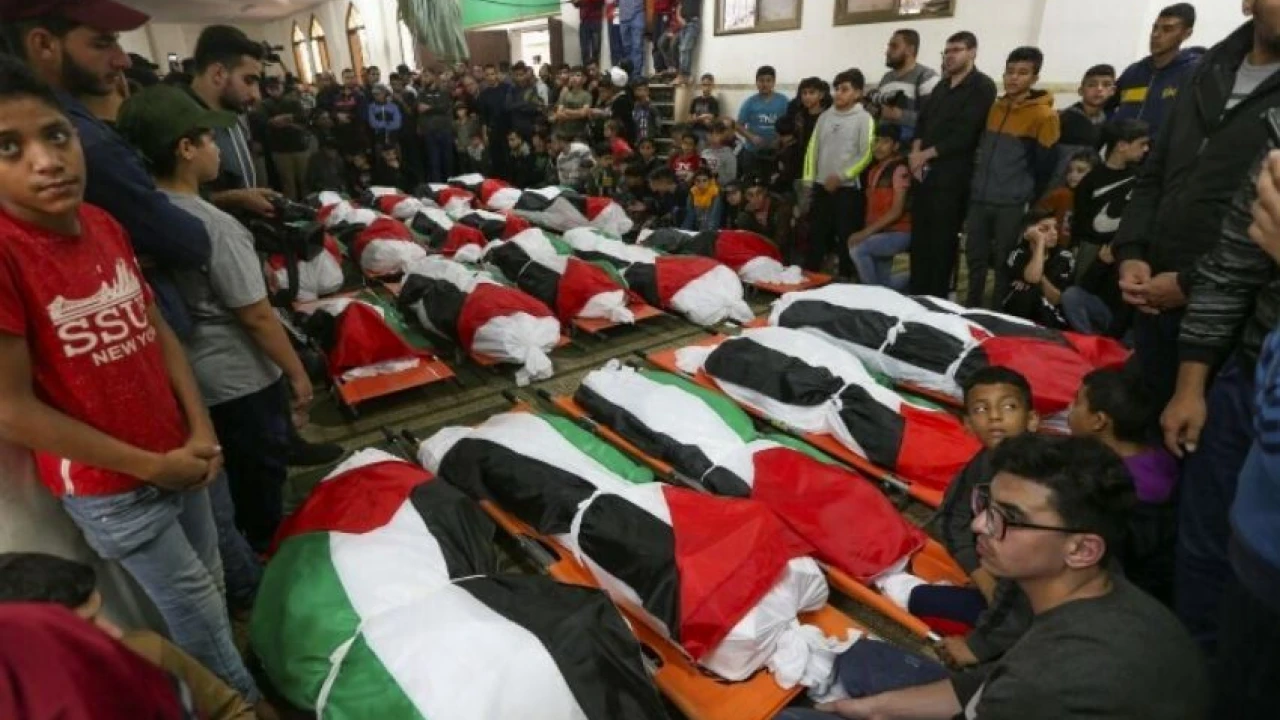 21 Gaza fire victims including eight children buried amid profound grief