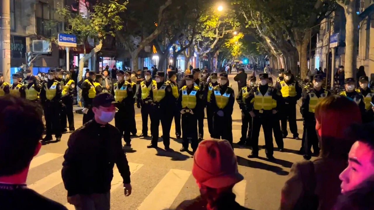 Shanghai tightens security after rare COVID protests across China