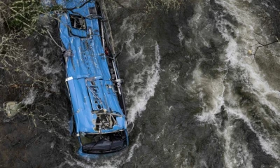 Six dead after bus plunges off bridge into river in Spain