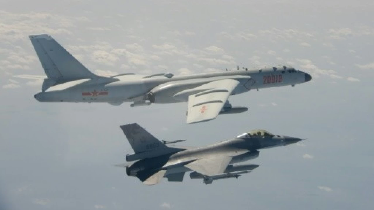 Tensions heighten as China sends another 56 jets into Taiwan defence zone