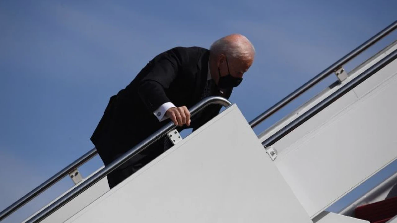 US President Joe Biden stumbles on plane steps