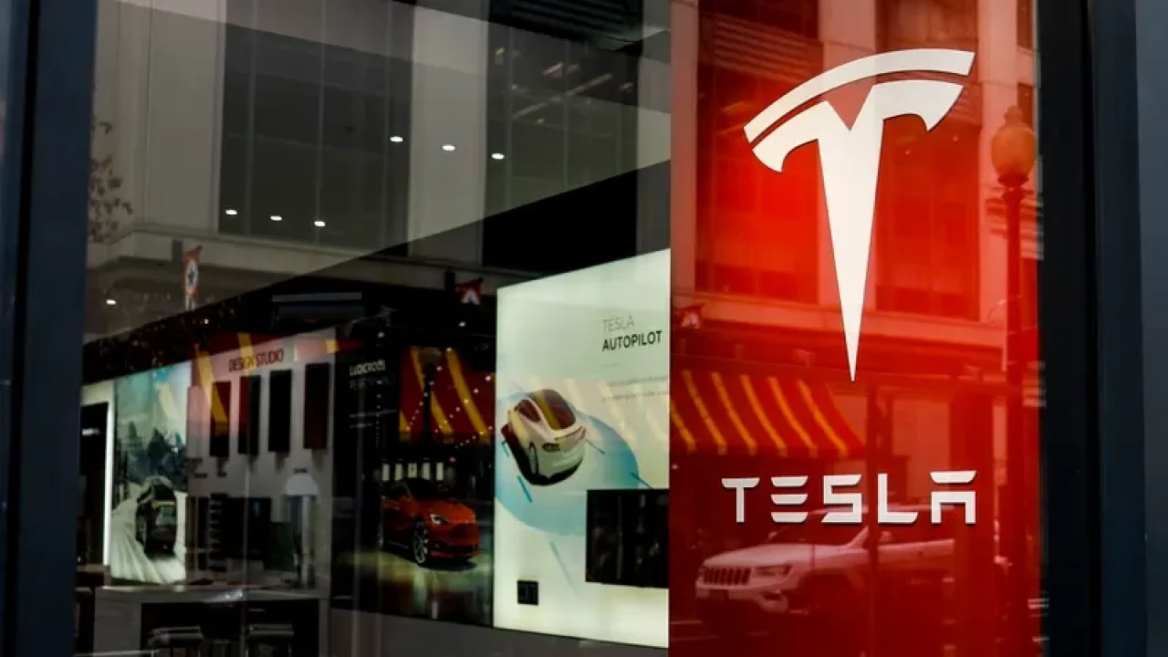 Tesla vows to halve EV production costs, Musk keeps affordable car plan under wraps
